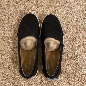 Toms Avalon black coated canvas slip ons
